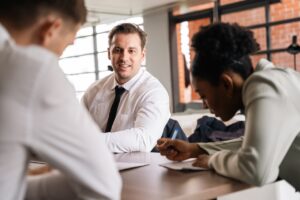 business owner discussing named perils coverage with employees