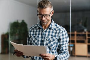 business owner researching about experience modification rate